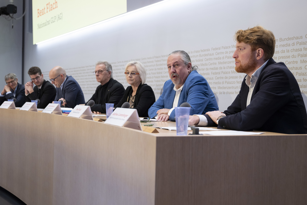 Persone in conferenza