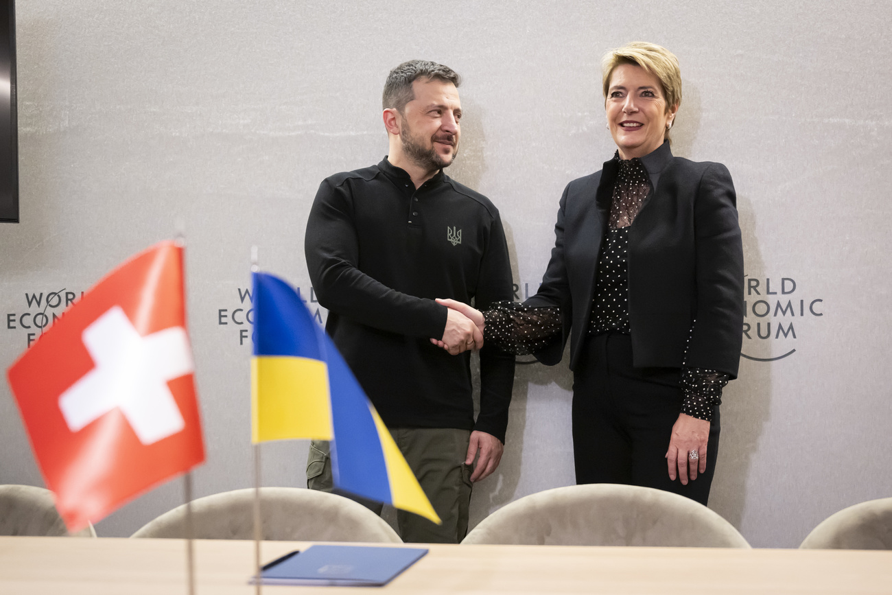 man and woman shaking hands