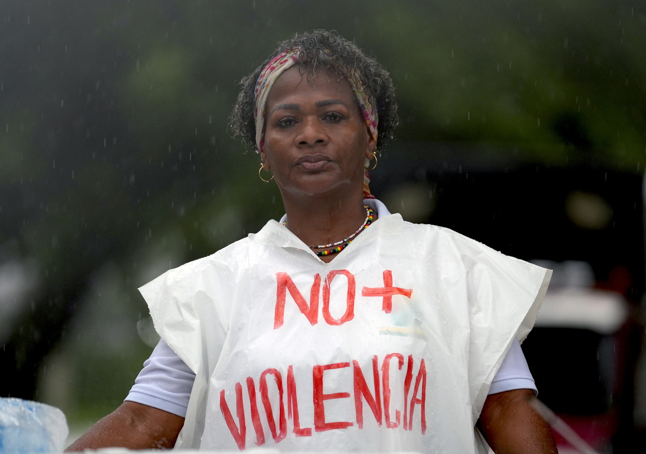 A woman takes part in a protest march in Buenaventura, Colombia, 10 April 2025.