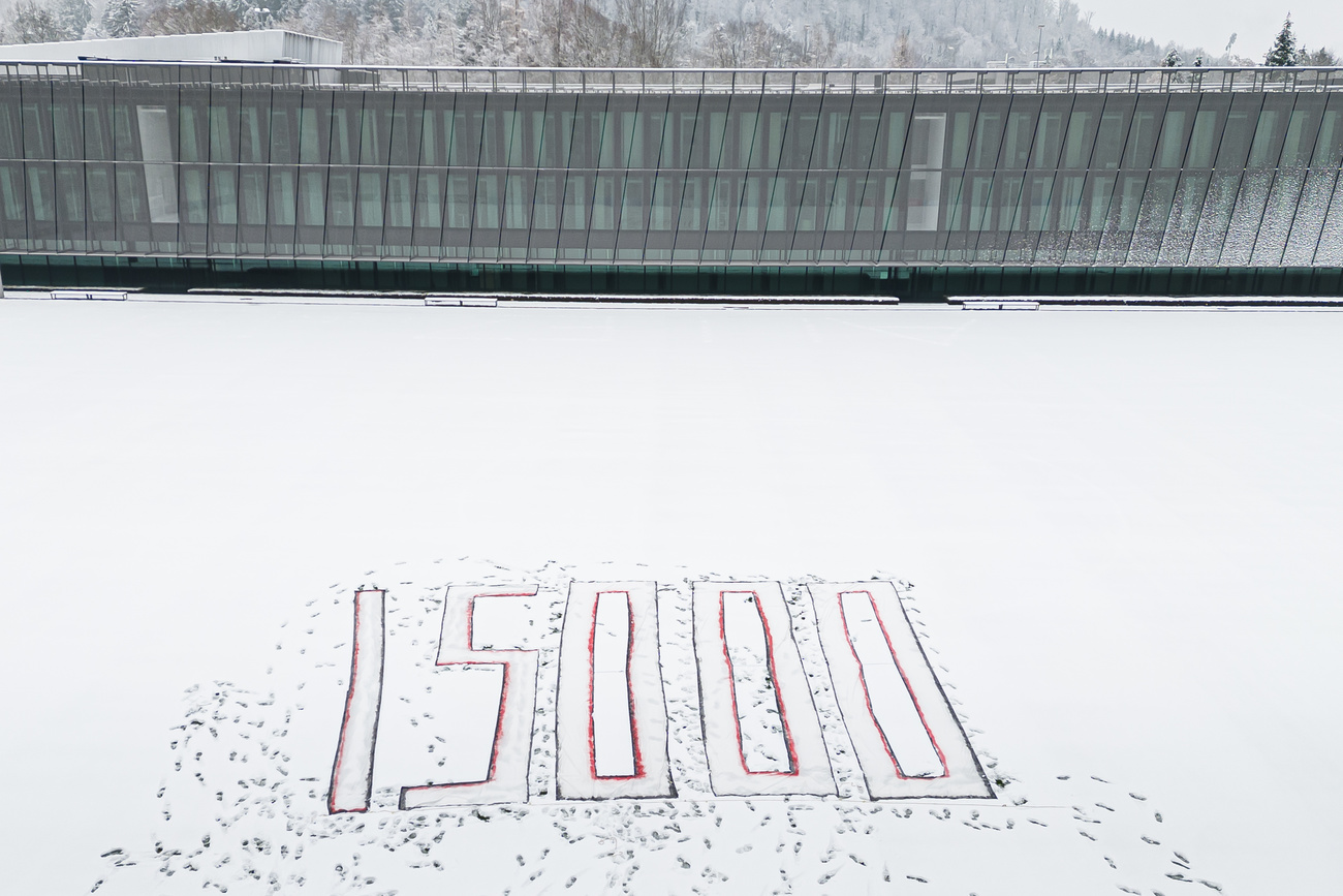 On the day of the final match of the FIFA World Cup in Qatar (2022), activists painted the number 15'000 in large figures on the grounds of the FIFA headquarters to draw attention to the number of migrant workers who had died in Qatar since the World Cup was awarded, according to Amnesty International.