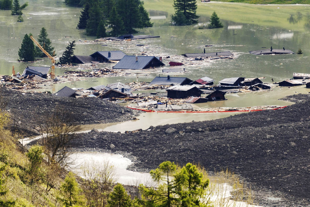 In Blatten, in the Lötschental valley in Valais, an estimated nine million cubic metres of ice, mud and rock crashed down a nearby mountain on May 28, wiping out the village. The few houses that remained intact were later flooded.