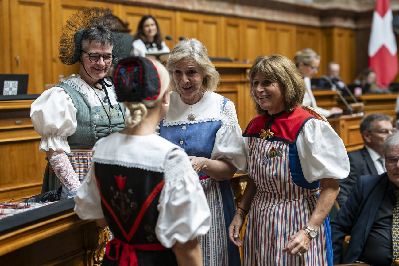 Female politicians in traditional kit
