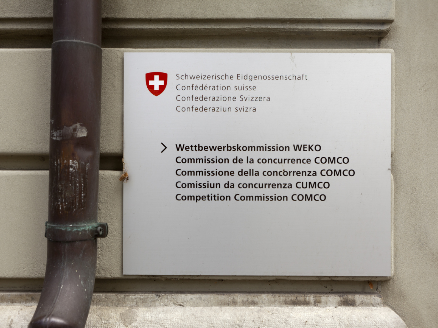 insegna comco