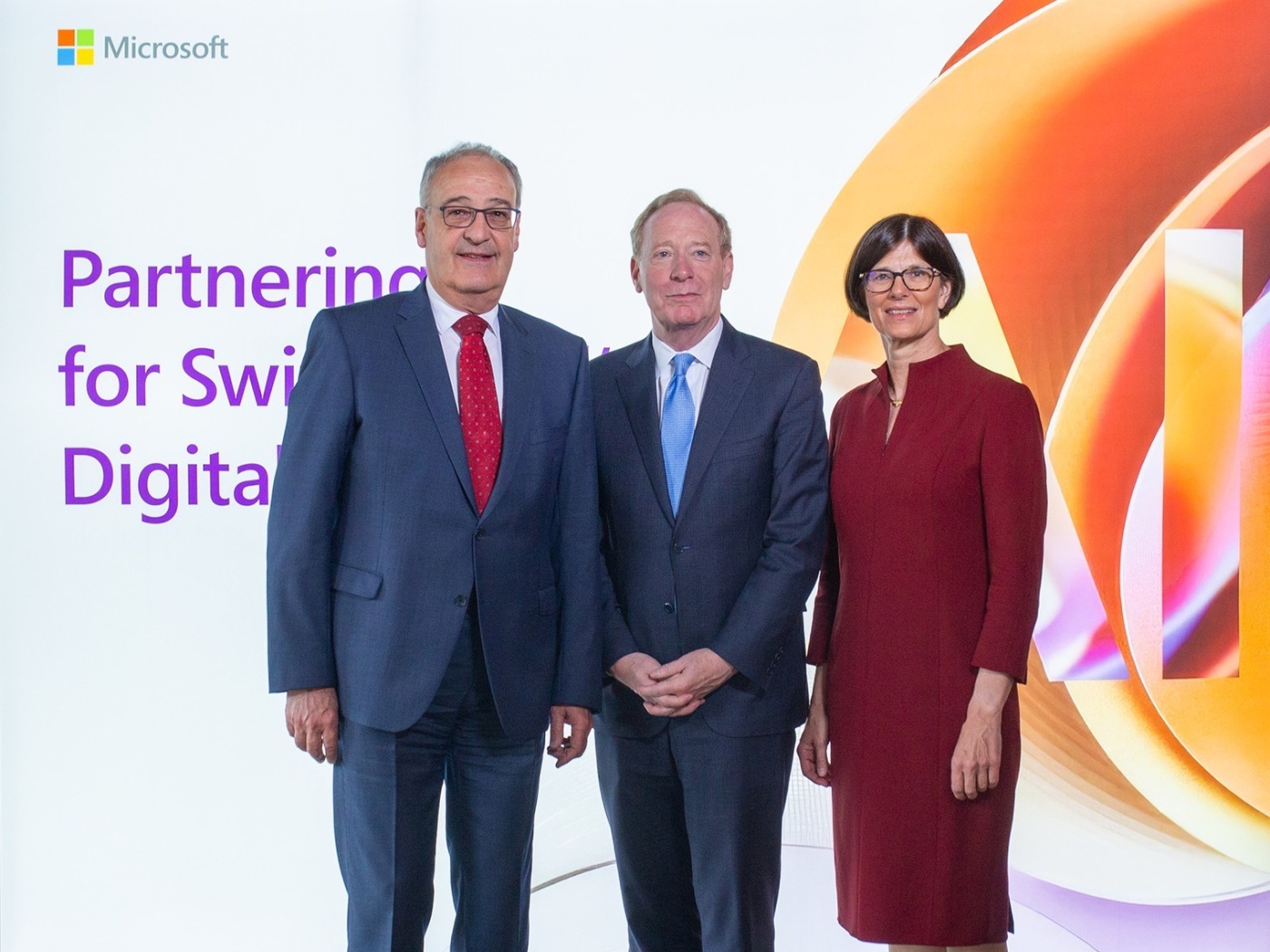Guy Parmelin, Brad Smith e Catrin Hinkel