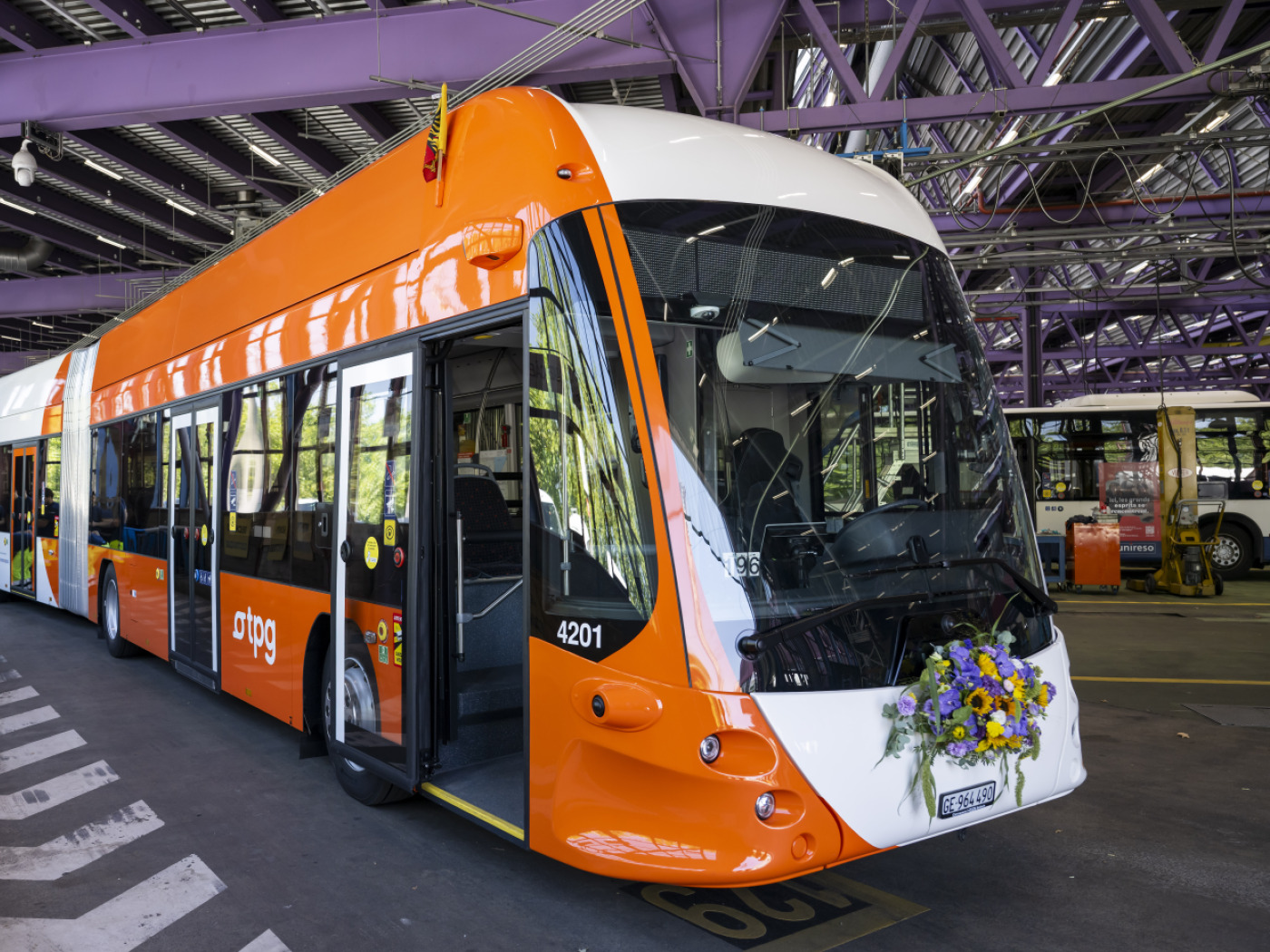 tpg unveils its first new-generation e-bus