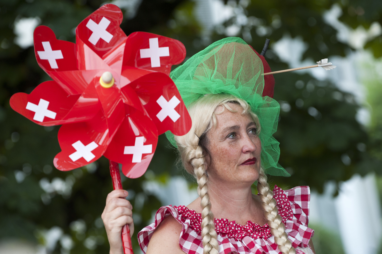Die Schauspielerin Fabienne Penseyres verkörpert Mademoiselle Heidi während der offiziellen Zeremonie auf der Place du Général Guisan in Lausanne am Freitag, dem 1. August 2014.