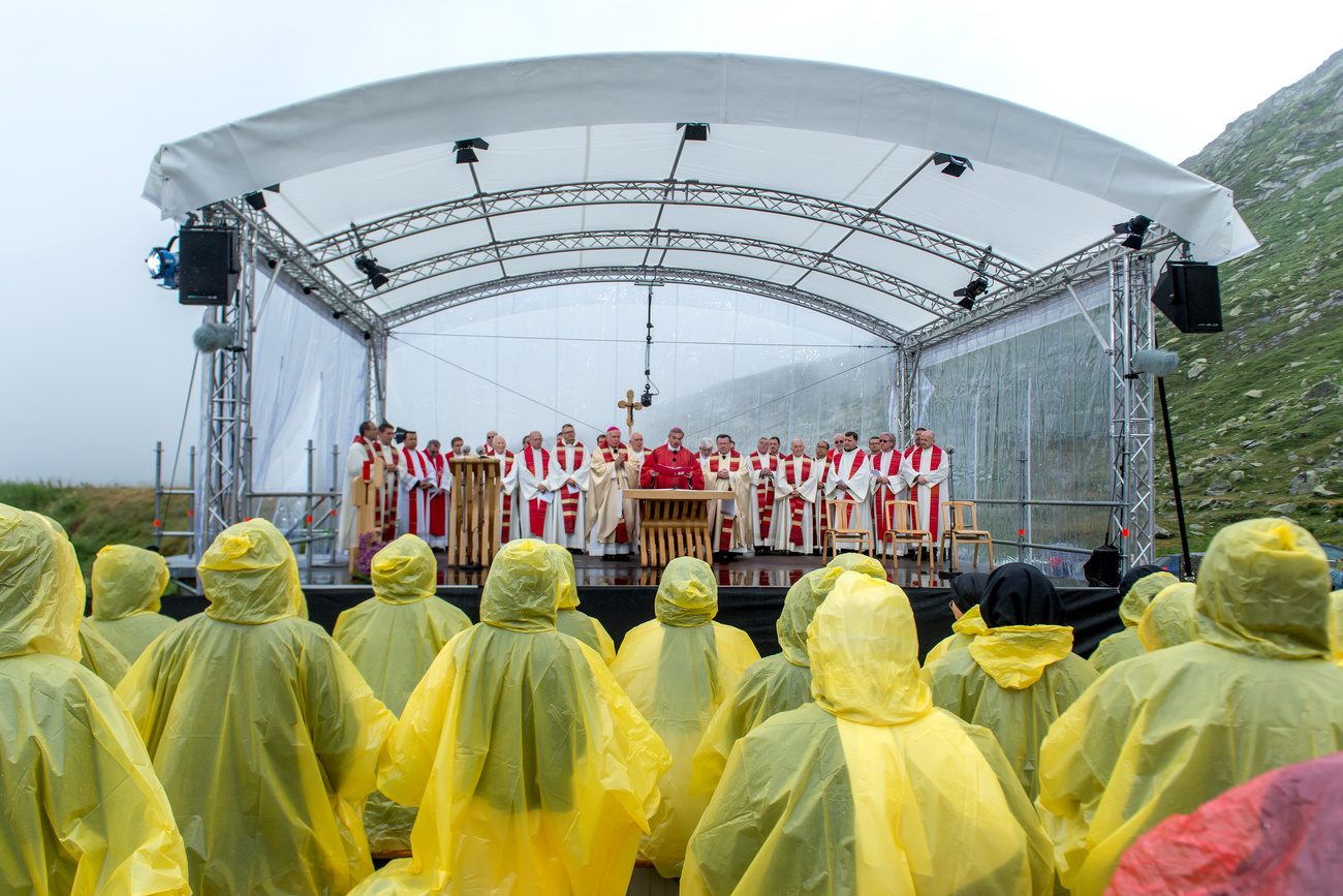 people in yellow ponchos