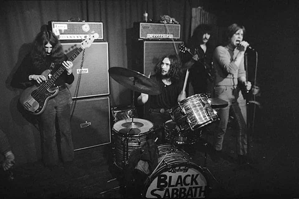 band playing in black-and-white photo