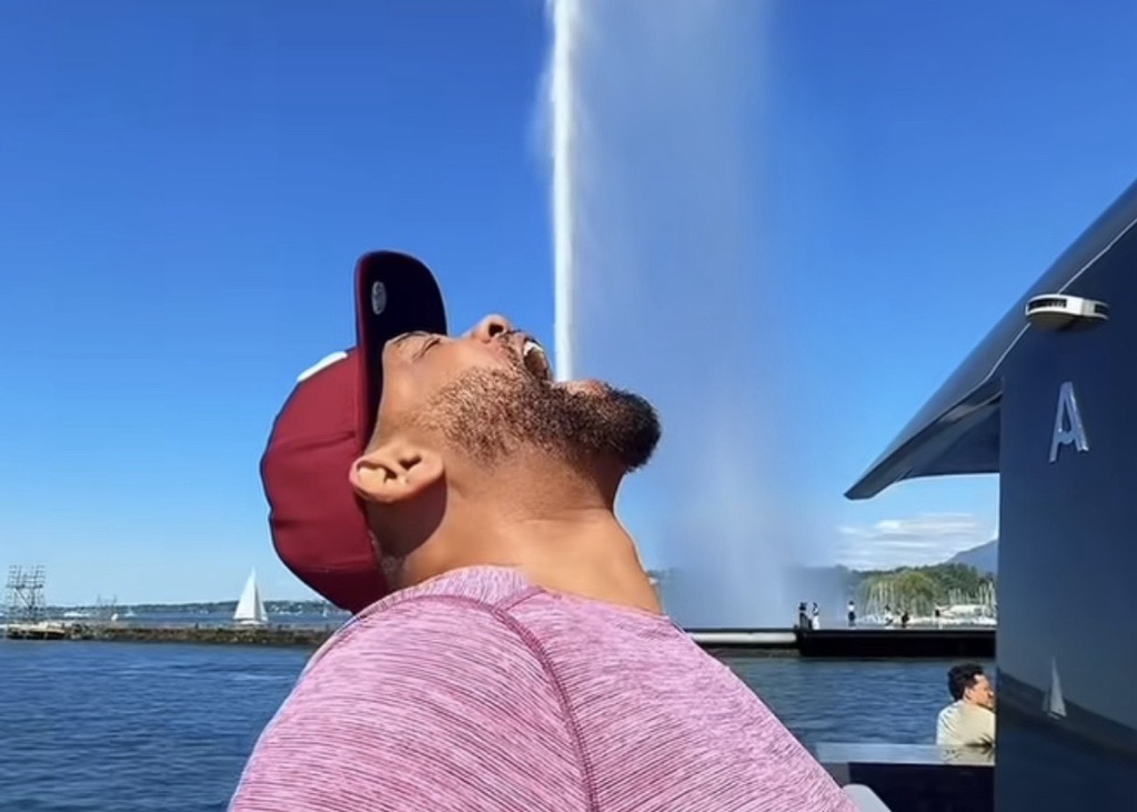 Will smith davanti al jet d'eau di ginevra