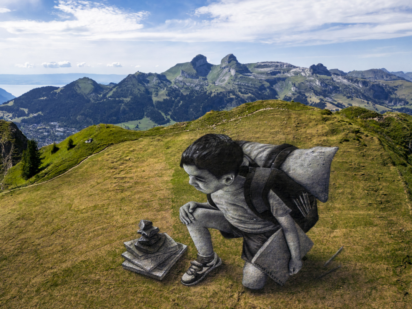 New work of art by Saype adorns the Vaud Alps