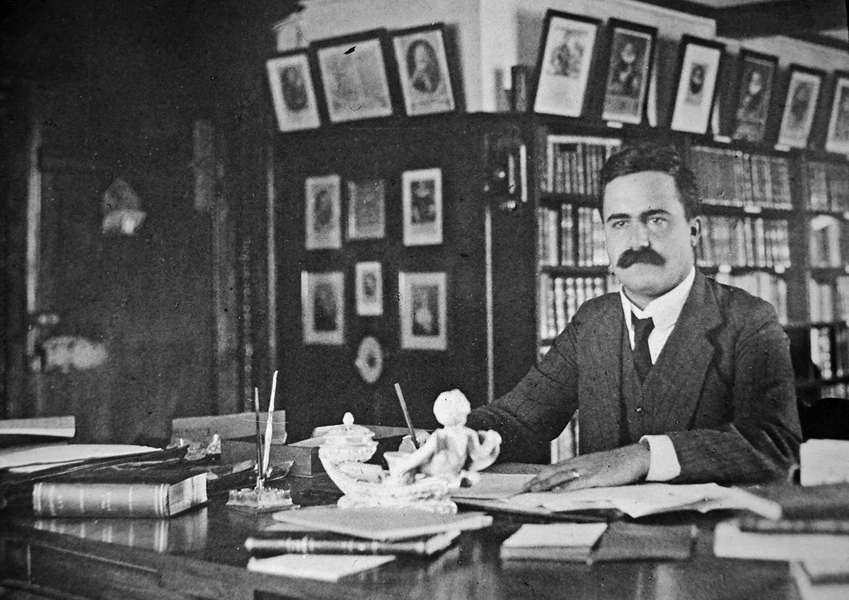 man working in study