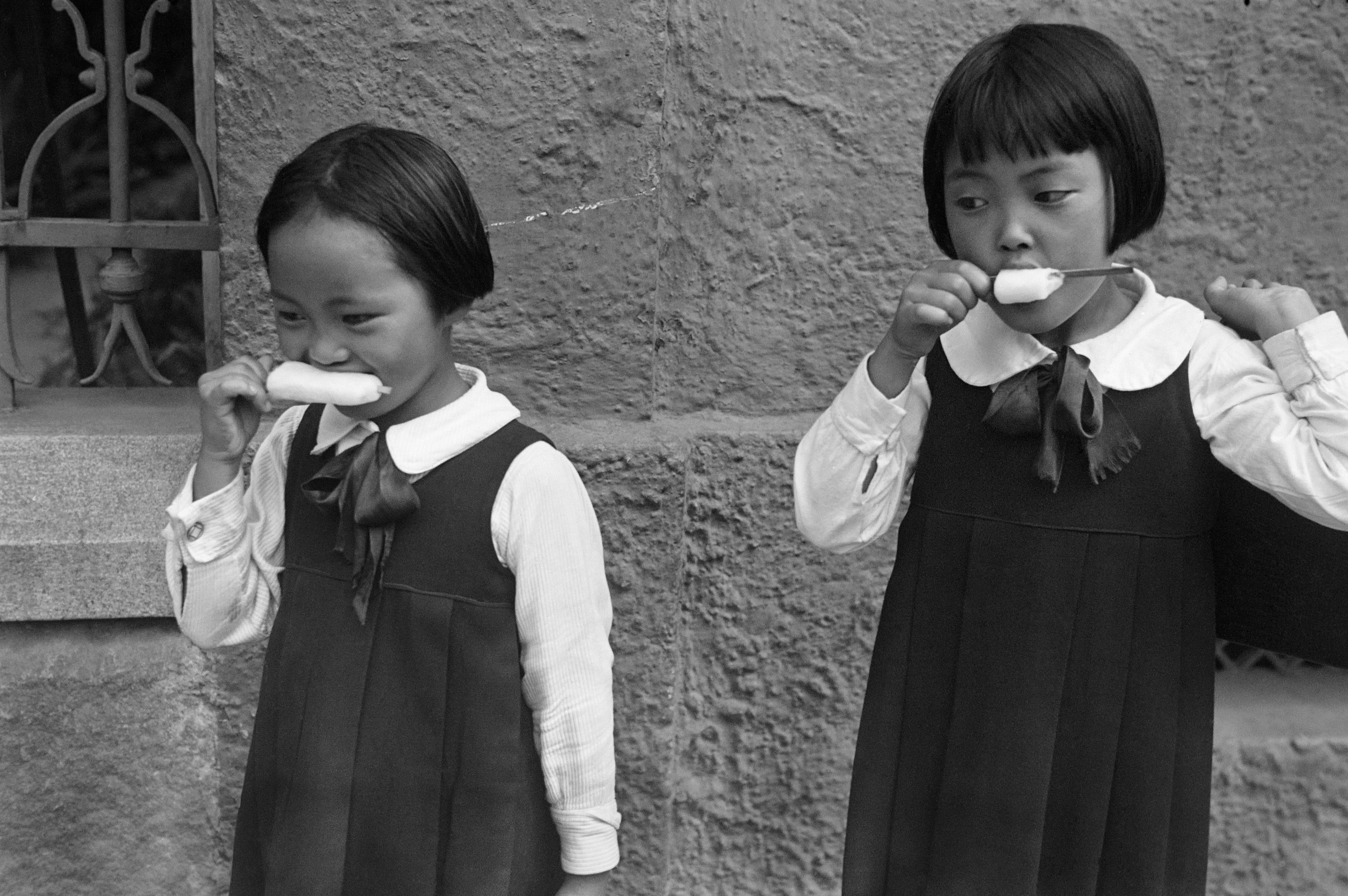 Girls eating ice cream in Liberdade, the Japanese neighbourhood, 1940. São Paulo is the city with the largest Japanese and Japanese-descendant population outside Japan.