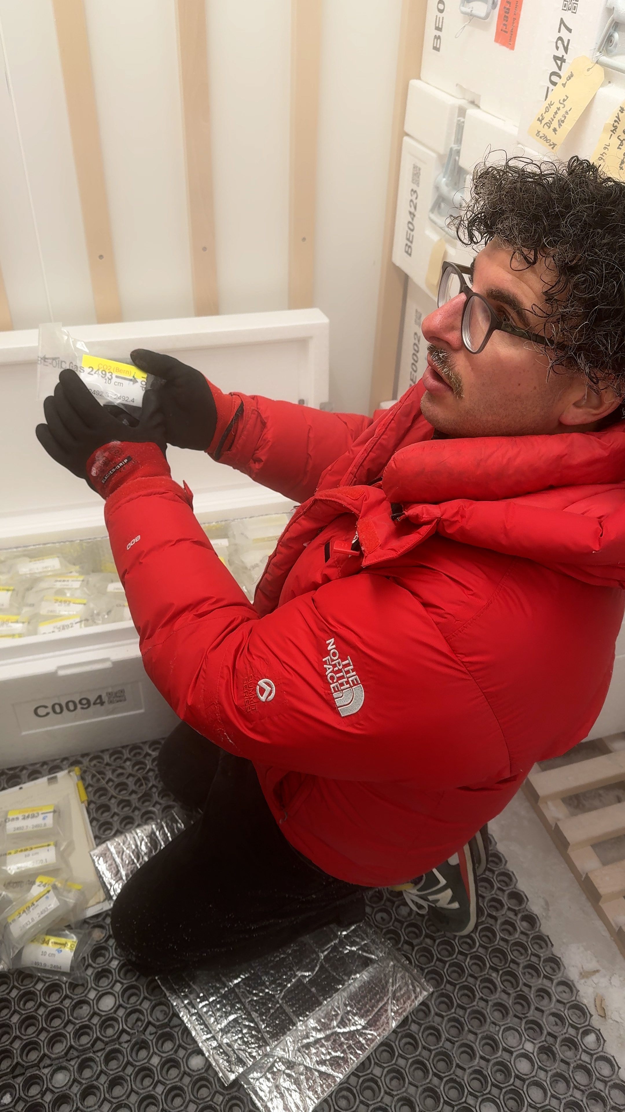Scientist Florian Krauss with ice core sample