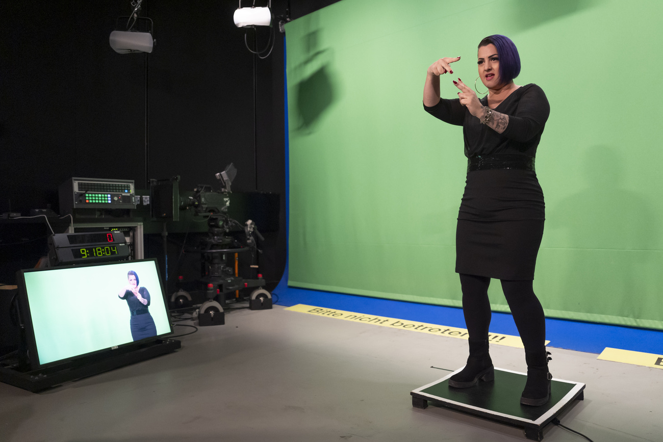 A person interpreting in sign language