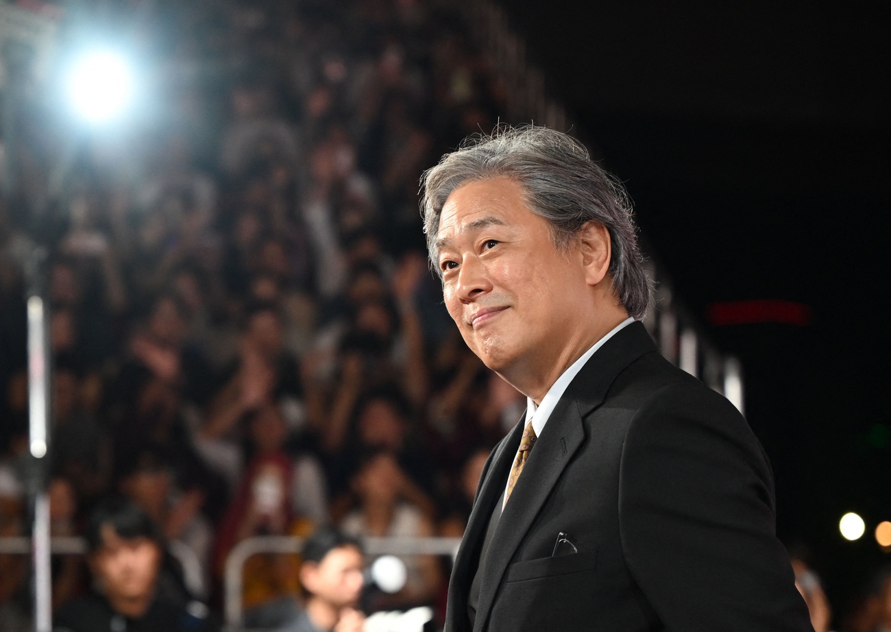 Park Chan-wook arrives on the red carpet during the opening ceremony of the 30th Busan International Film Festival (BIFF) at the Busan Cinema Center in Busan on September 17, 2025.