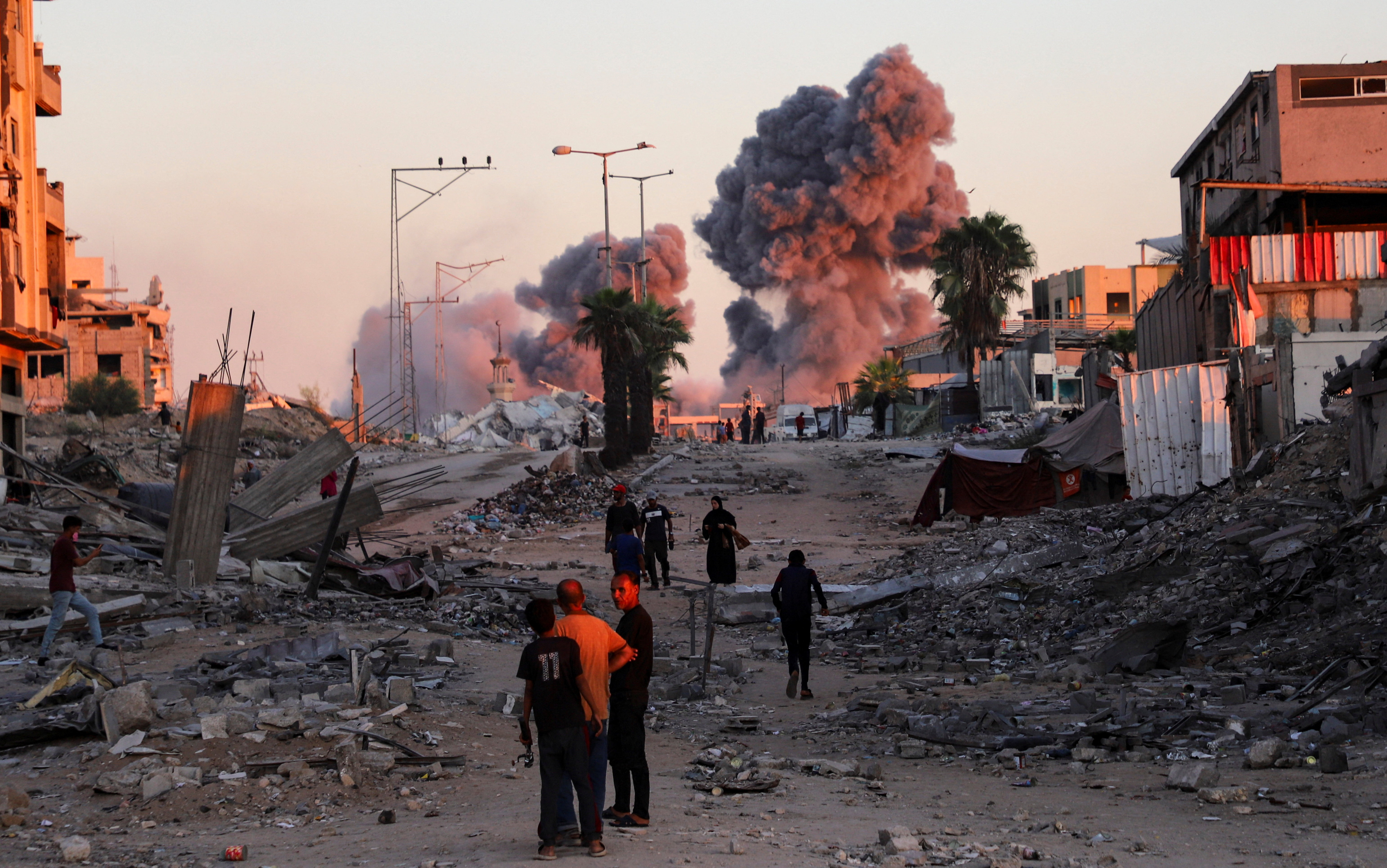 إسرائيل وحماس تتفقان على المرحلة الأولى من خطة ترامب لإنهاء حرب غزة - SWI  swissinfo.ch