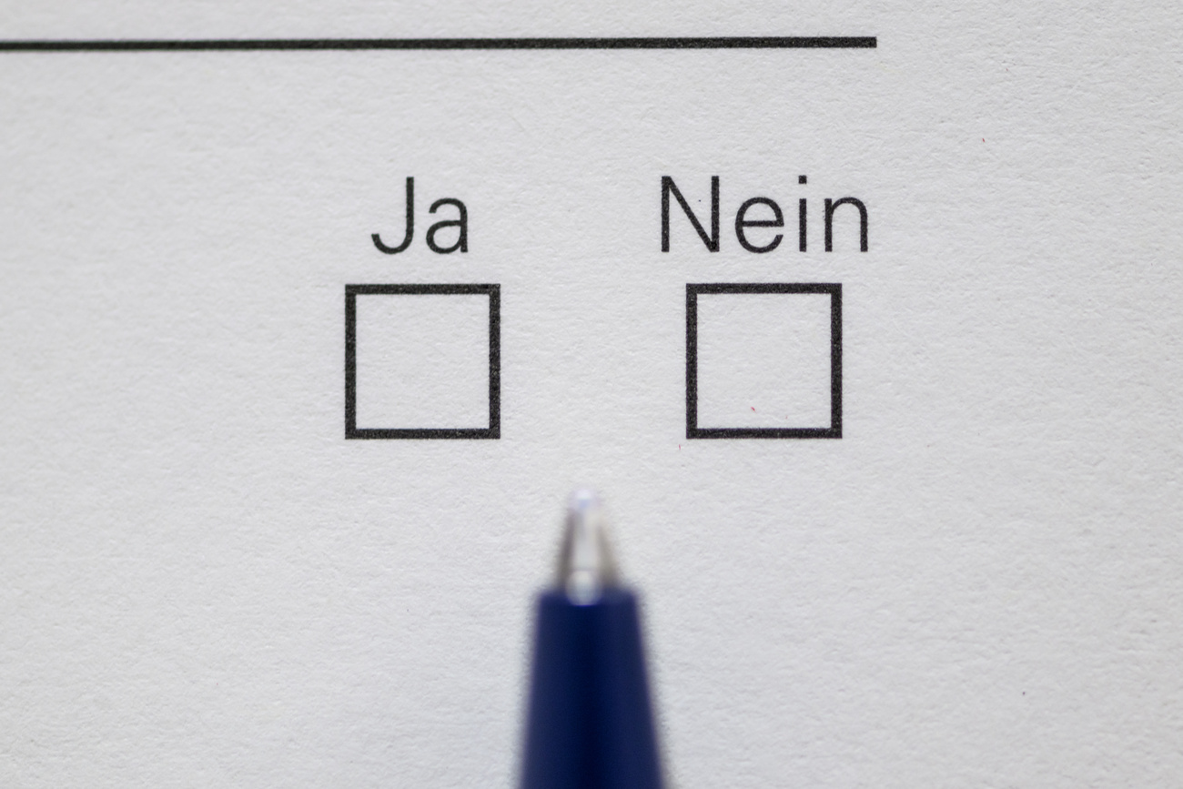 Zwei Boxen auf einem weissen Papier, beschriftet mit Ja und Nein