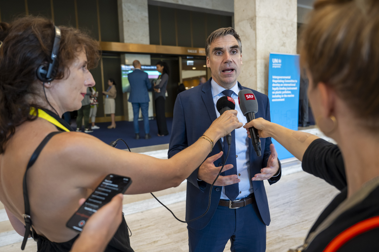 Swiss climate envoy Felix Wertli talks to reporters at COP30.
