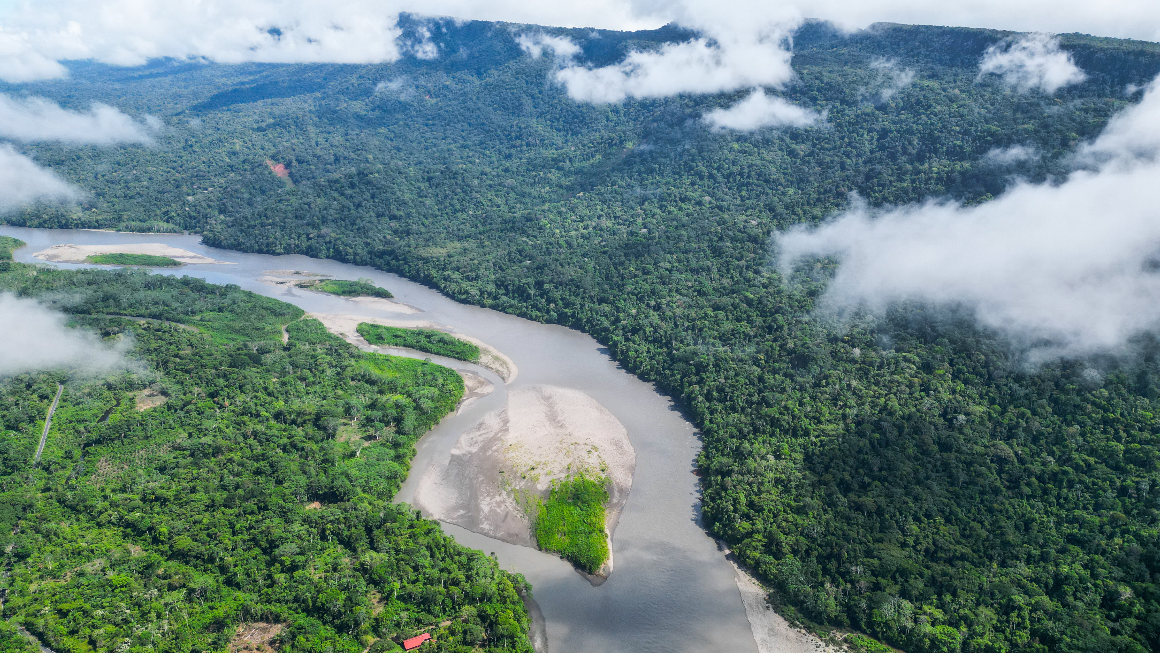 Aerial images of the community of Shintuya on the banks of the Alto Madre de Dios River. Shintuya, located in the Manu province and district of the Madre de Dios region, is the oldest native community that is part of the Amarakaeri Indigenous Reserve. It was founded on September 29, 1950, and is the first community of the Harakbut people.
