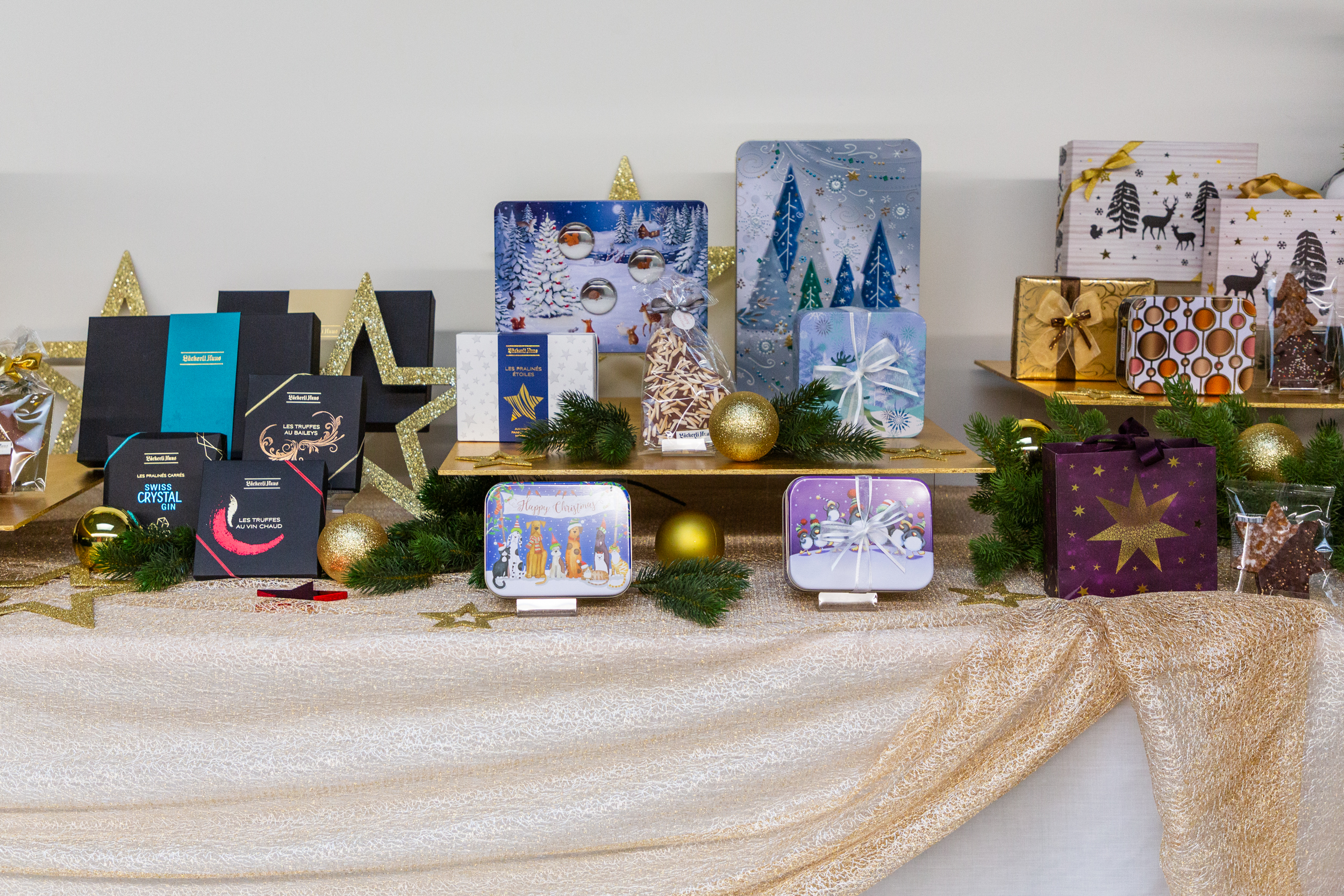 Various boxes and bags on a decorated table