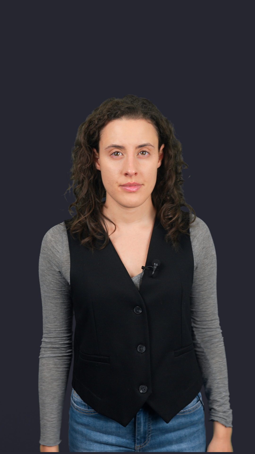 Photo of woman in front of black background