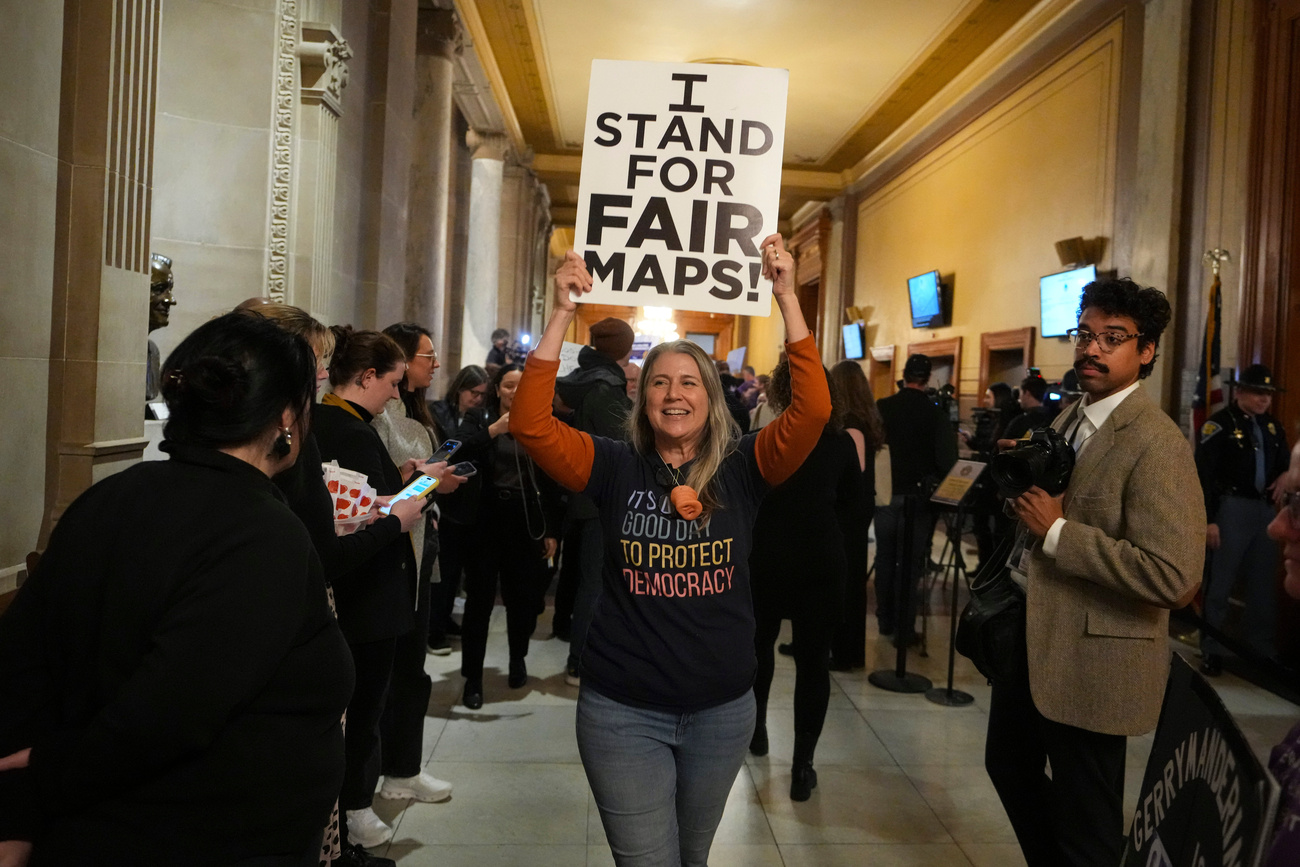 A protester outside the Indiana Senate Chamber in Indianapolis on December 11 after a bill to redistrict the state’s congressional map was defeated.