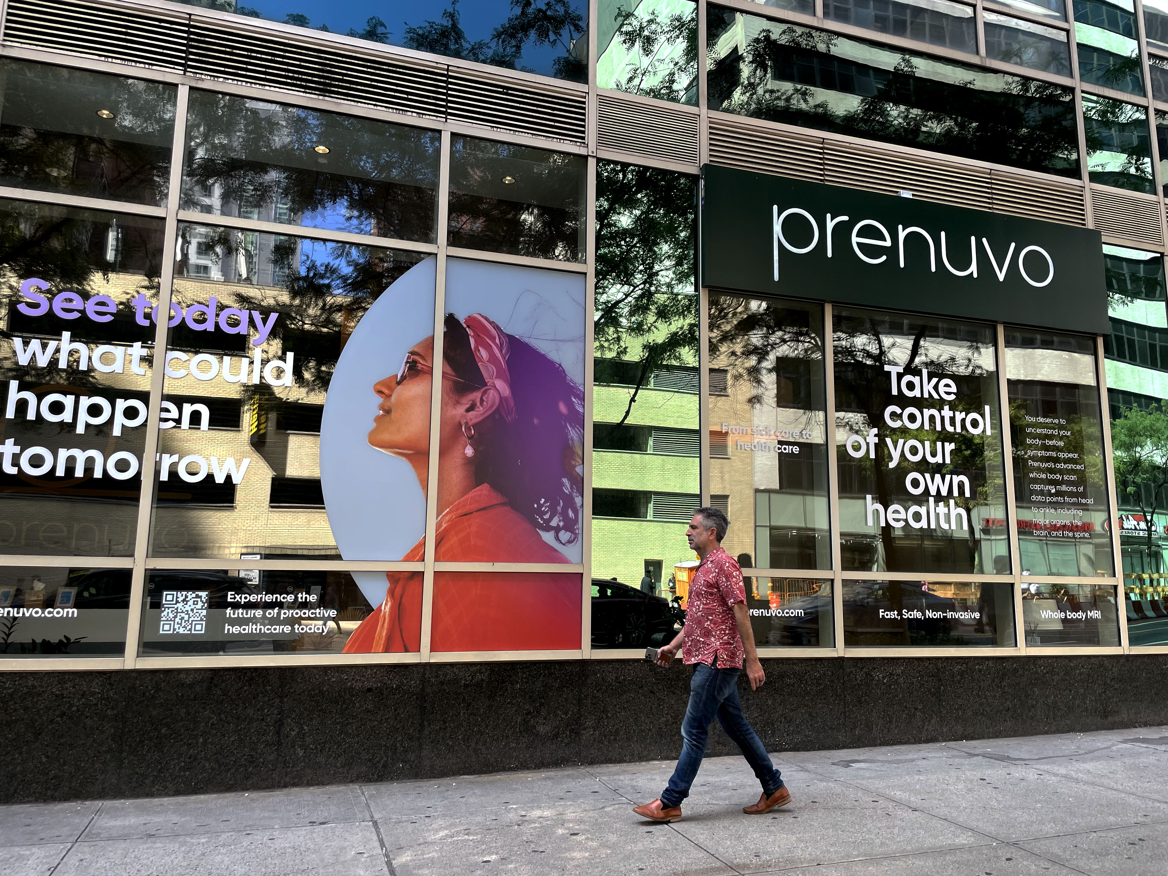 Man walks past full body scan clinic Prenuvo in New York, United States.
