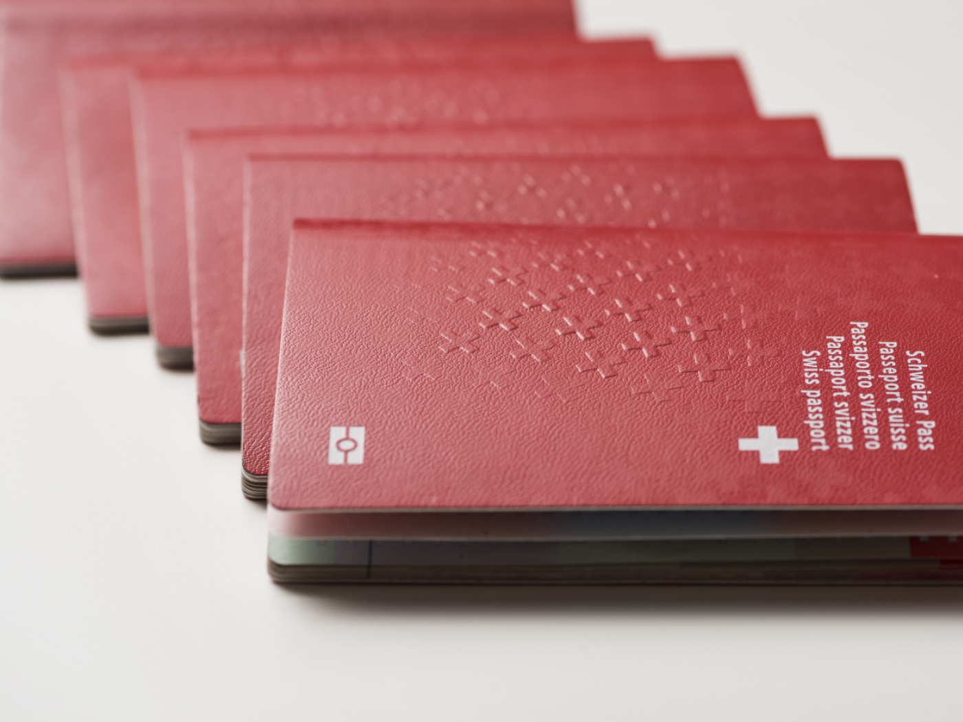 Swiss citizenship costs cut in Basel and Bern, but big gaps remain