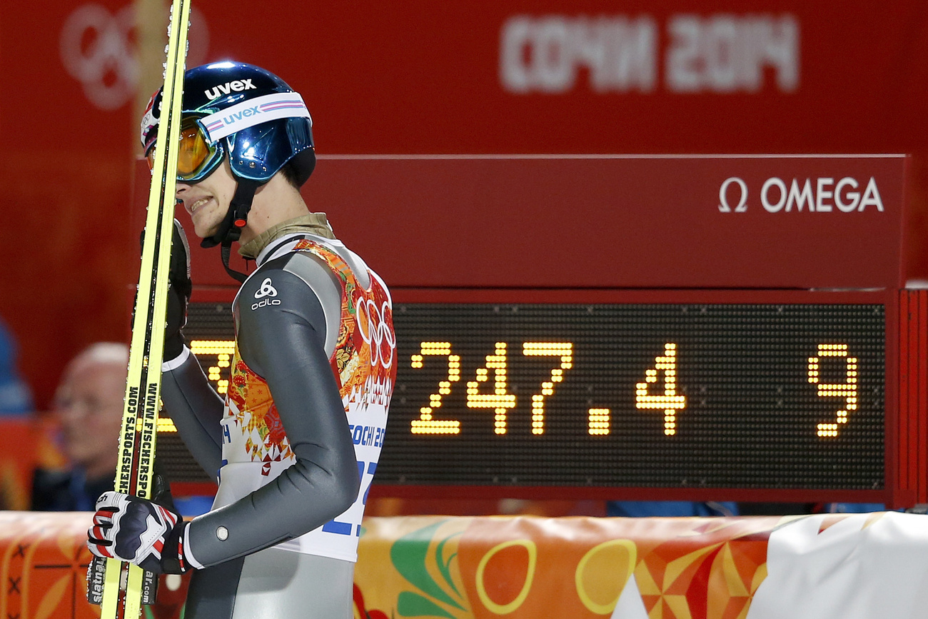 Un concorrente di salto con gli sci all'ediizone di Sochi 2014.