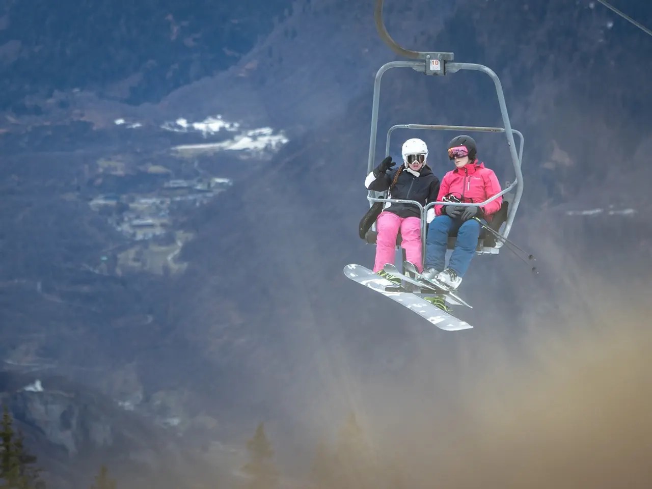 Very little snow is visible in the Carì ski resort.