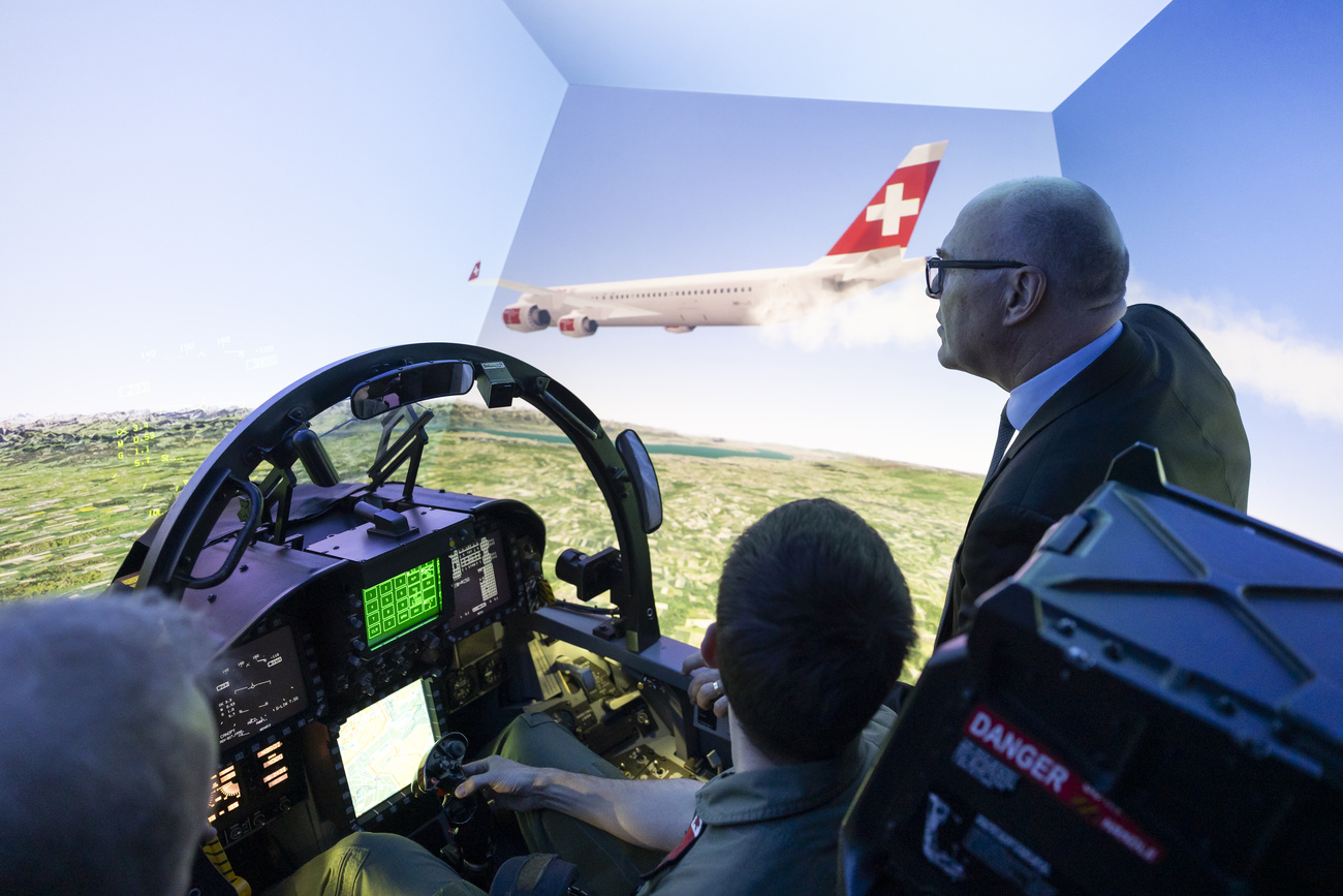 Defence Minister Martin Pfister in a Swiss Army flight simulator.