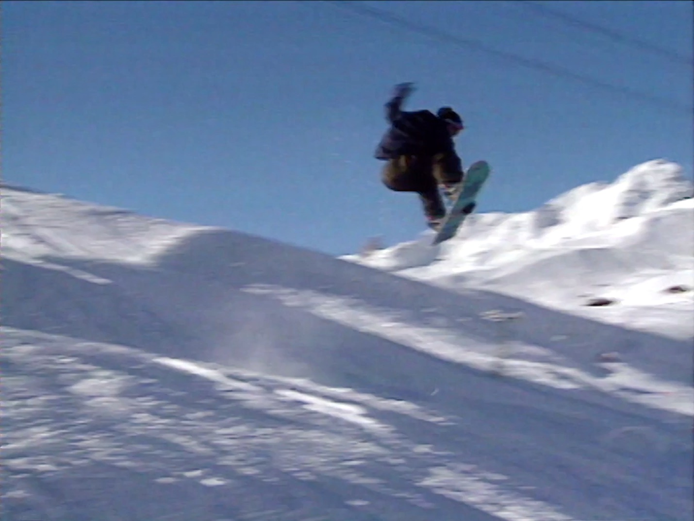 Salto con snowboard