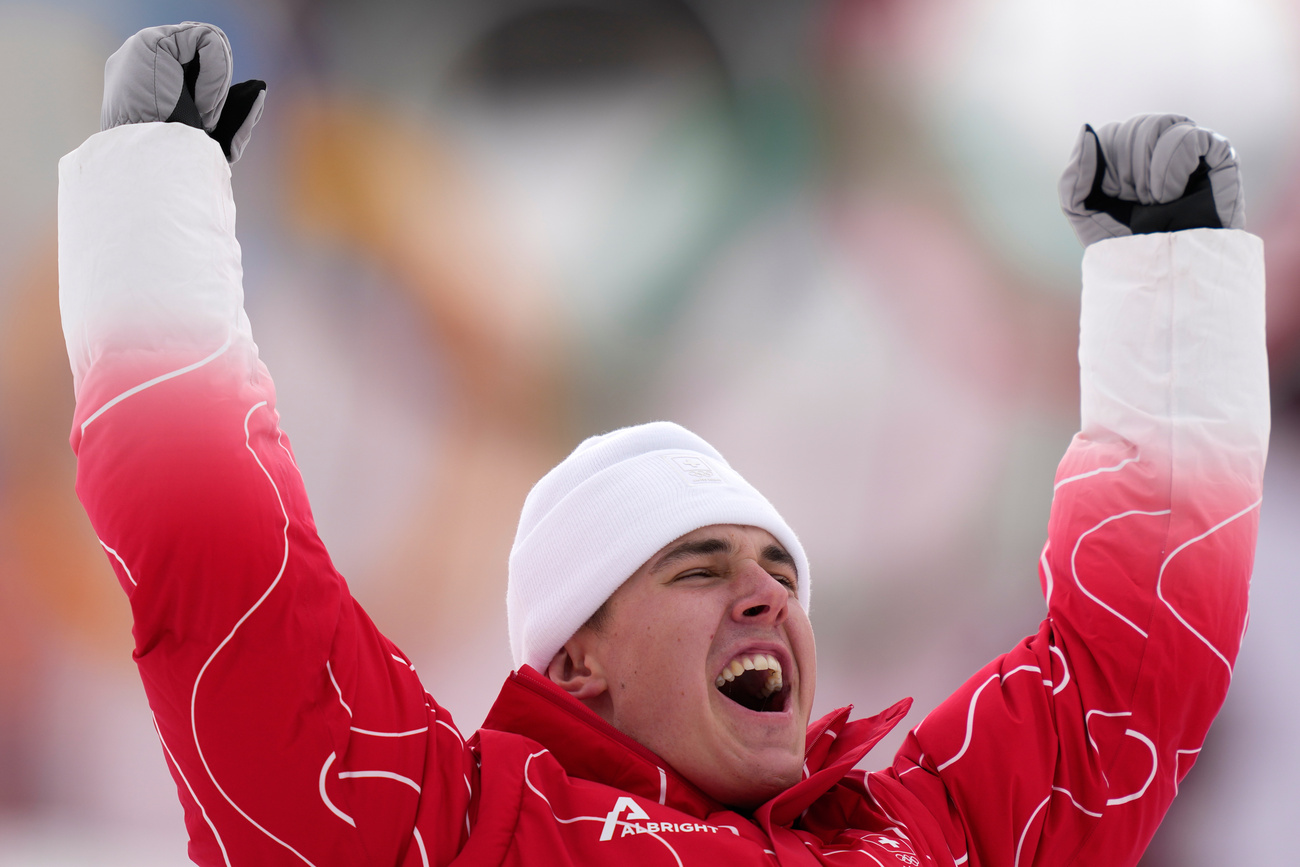 Franjo von Allmen is jubilant after his victory in the super-G, earning himself a third golden medal.