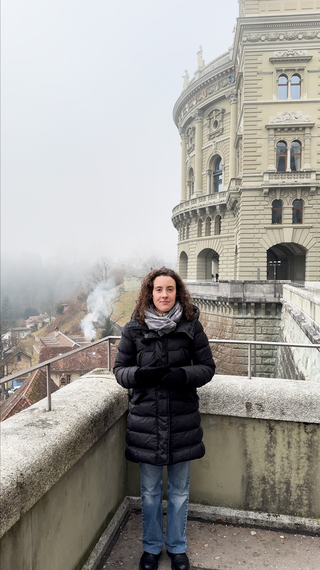 Photo of woman in front of Swiss Parliament
