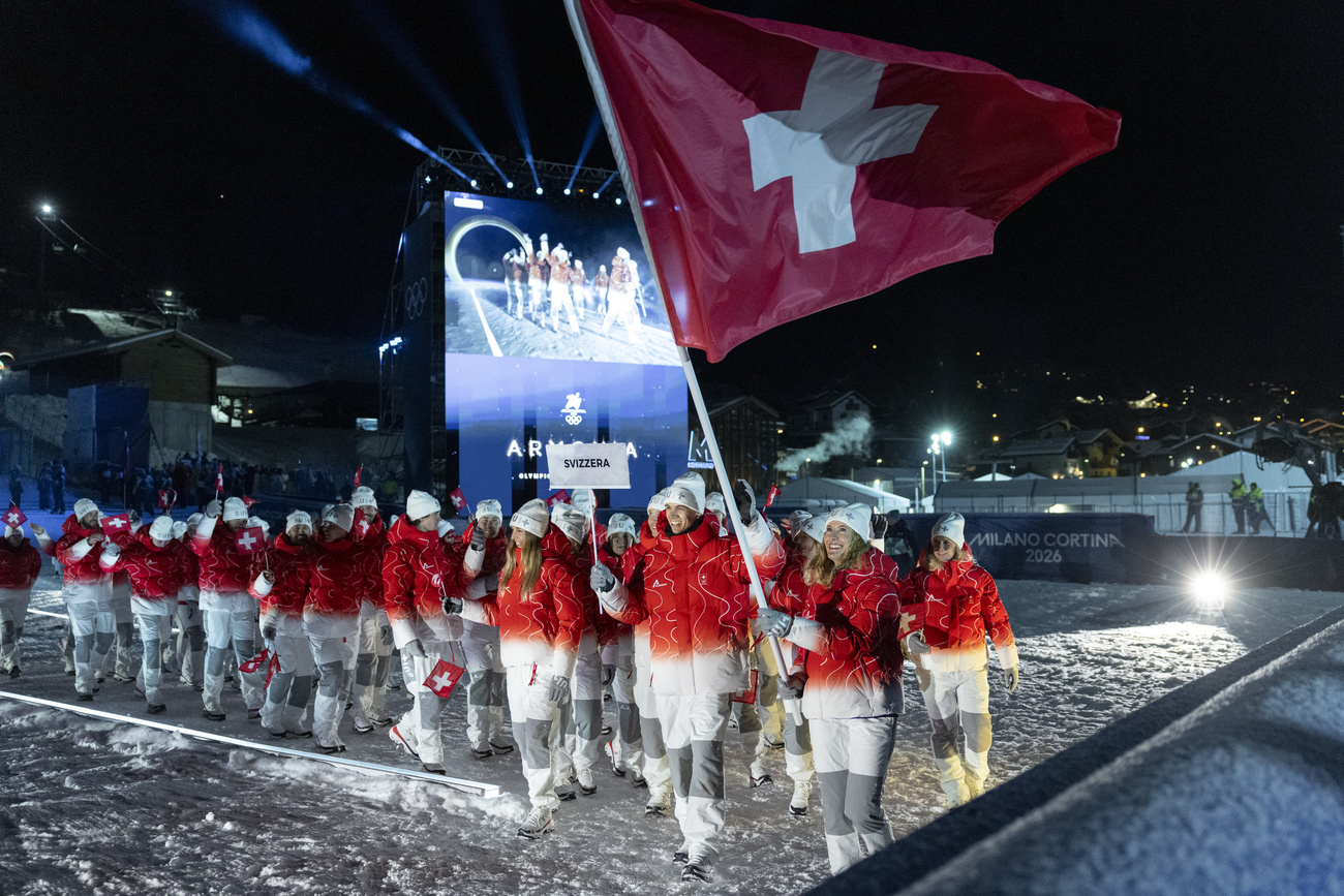 Nino Niederreiter and Fanny Smith led out the Swiss athletes in Italy