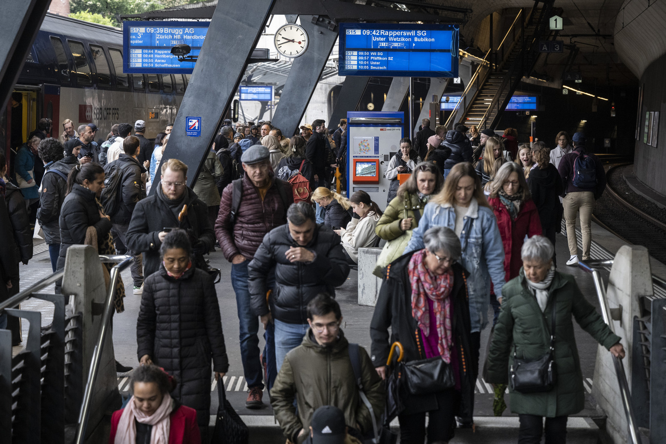 Commuter traffic at Stadelhofen station in Zurich.