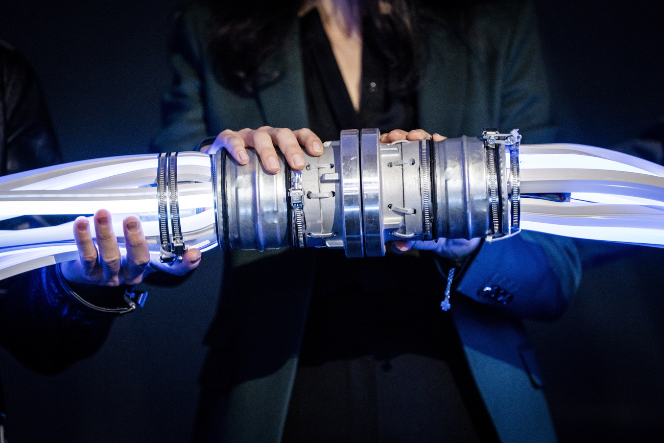 A supercomputer is being powered on during a photo op.