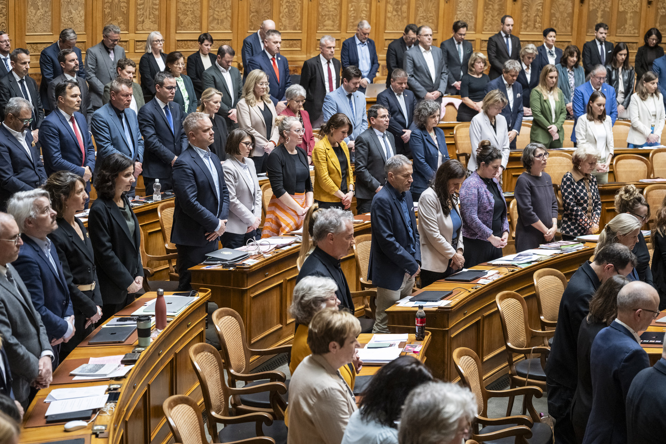 Members of Swiss House of Representatives hold minute's silence in memory of Crans Montana fire victims.