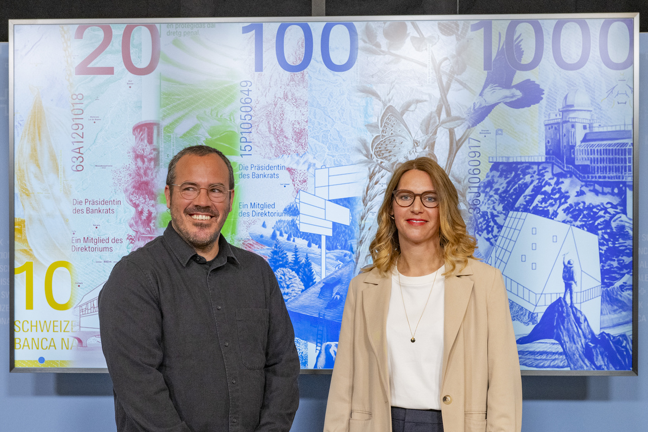 The two winners, Sébastien Fasel and Fabienne Kilchör, pose in front of their work at the presentation of the competition results.