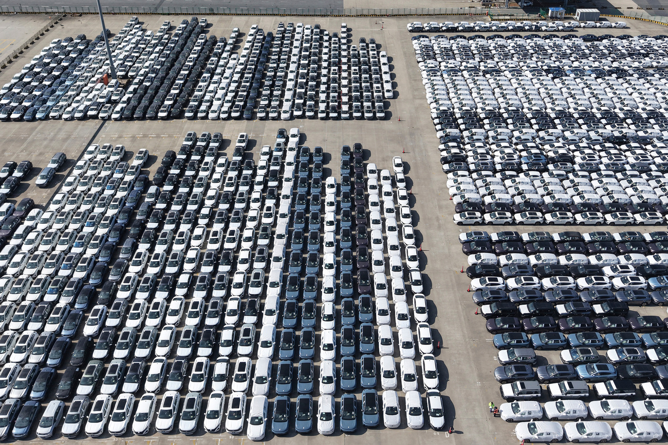 An aerial view of new cars for export seen at a port in Shanghai, March 10, 2026.