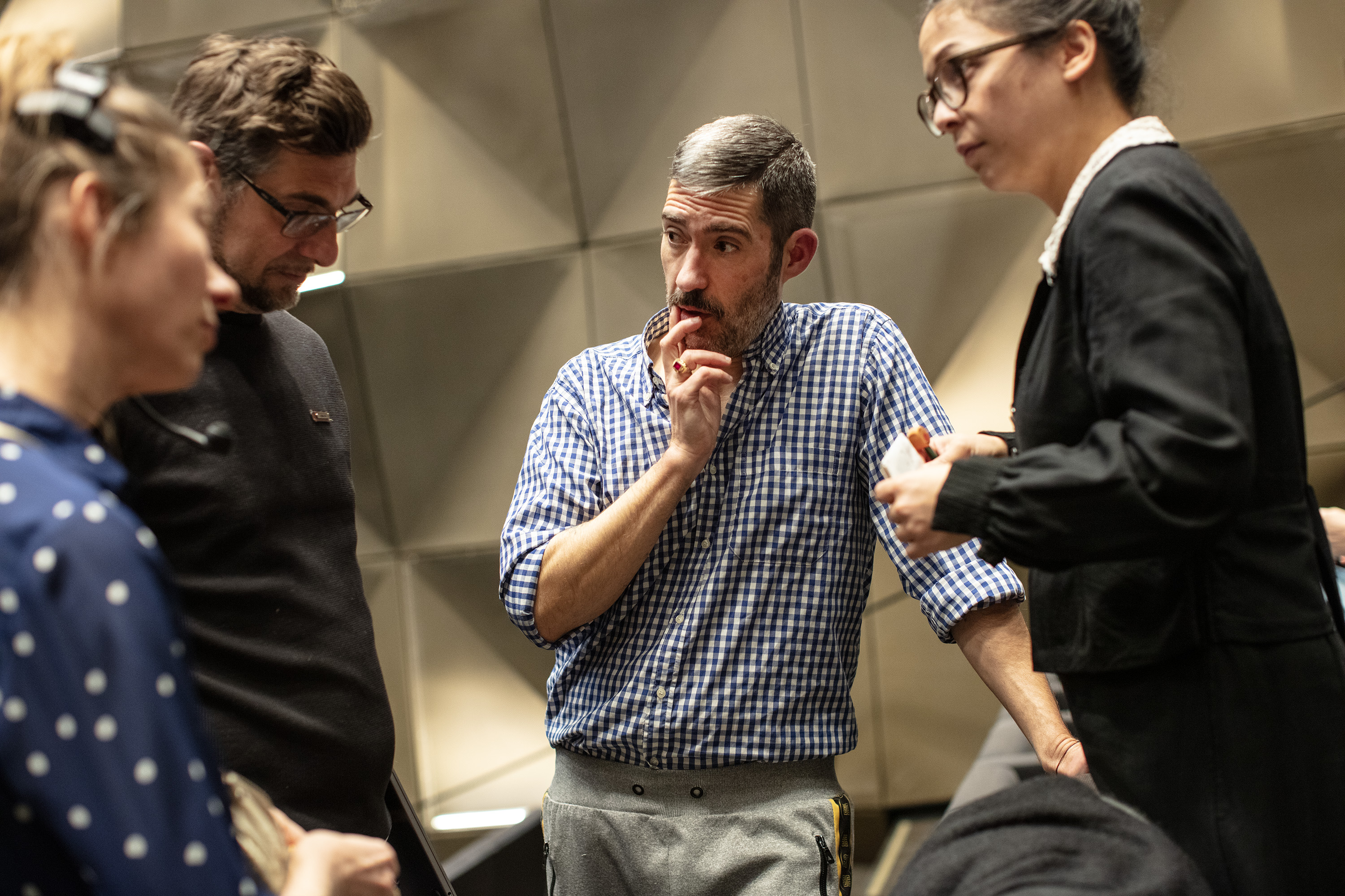 Director talking with assistants