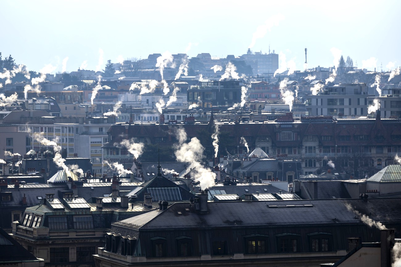 smoke from the chimneys of buildings