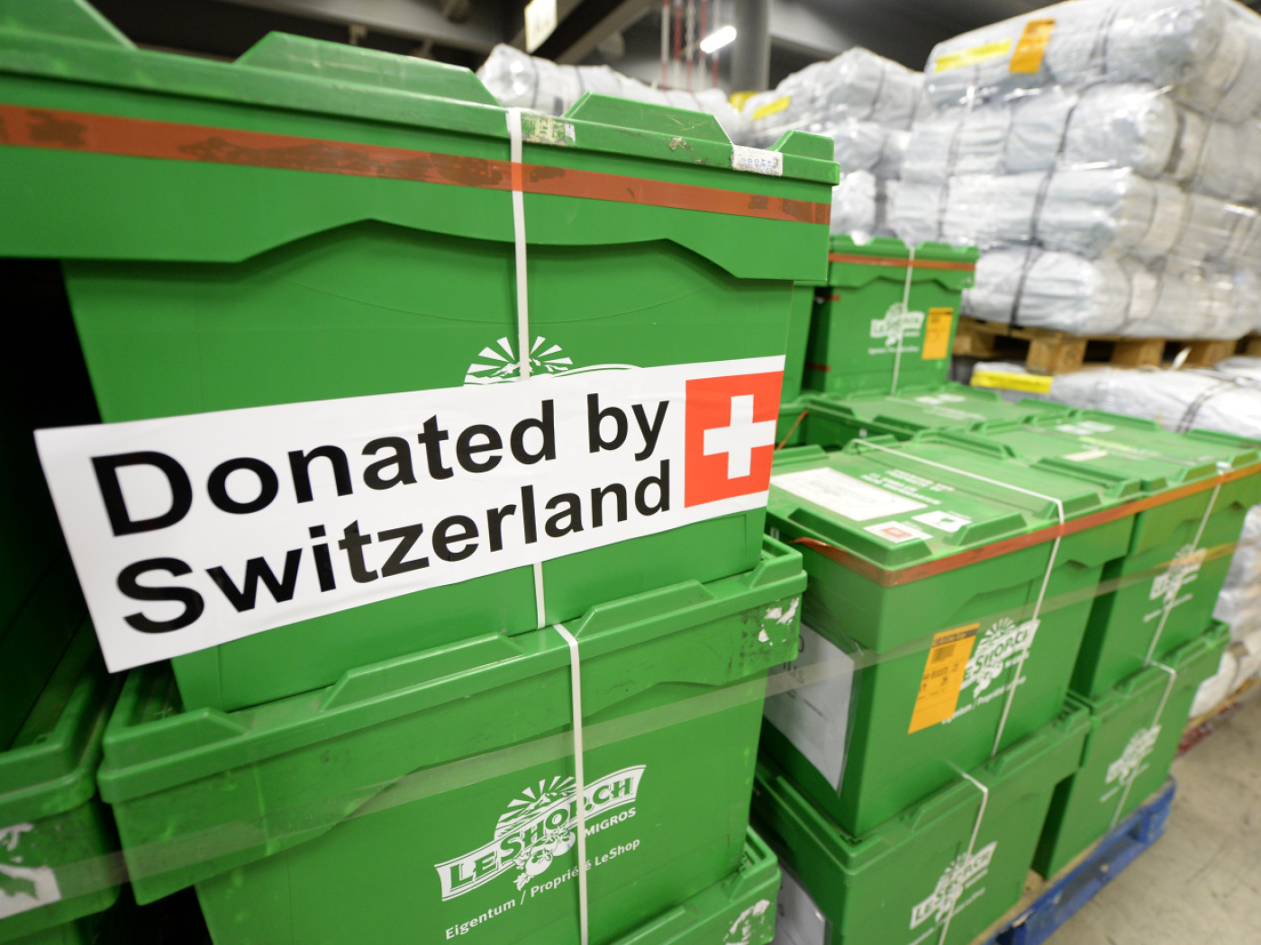 boxes marked 'Donated by Switzerland'