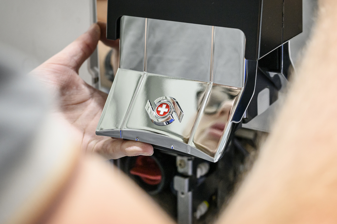 The Swiss cross on a brand-new Thermoplan coffee machine.