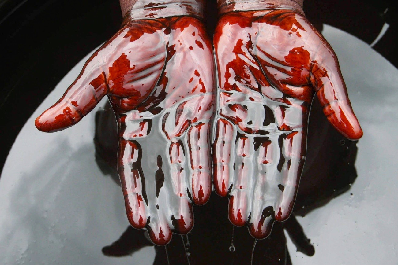 hands stained with oil