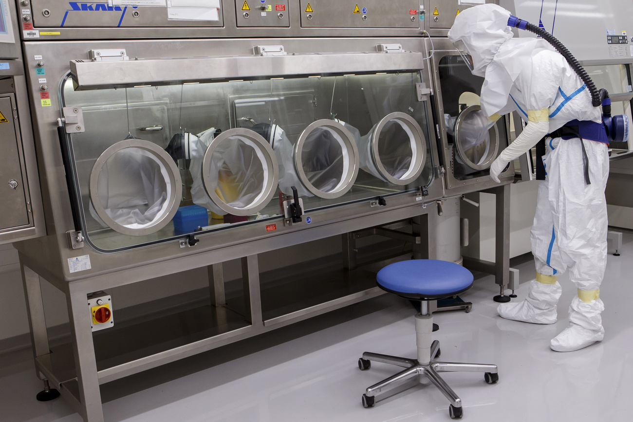 A person in a virus lab.