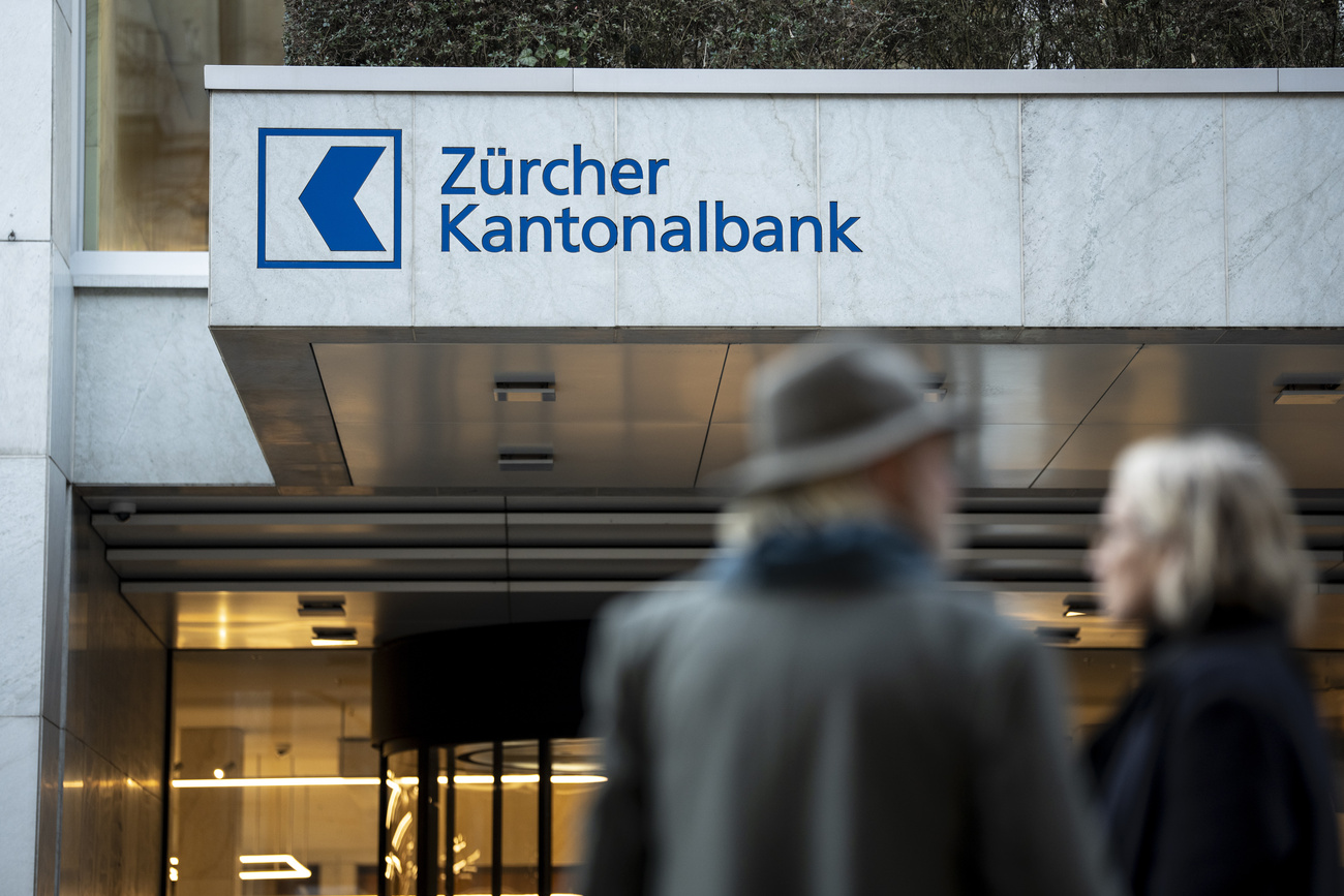 man in hat and bank logo