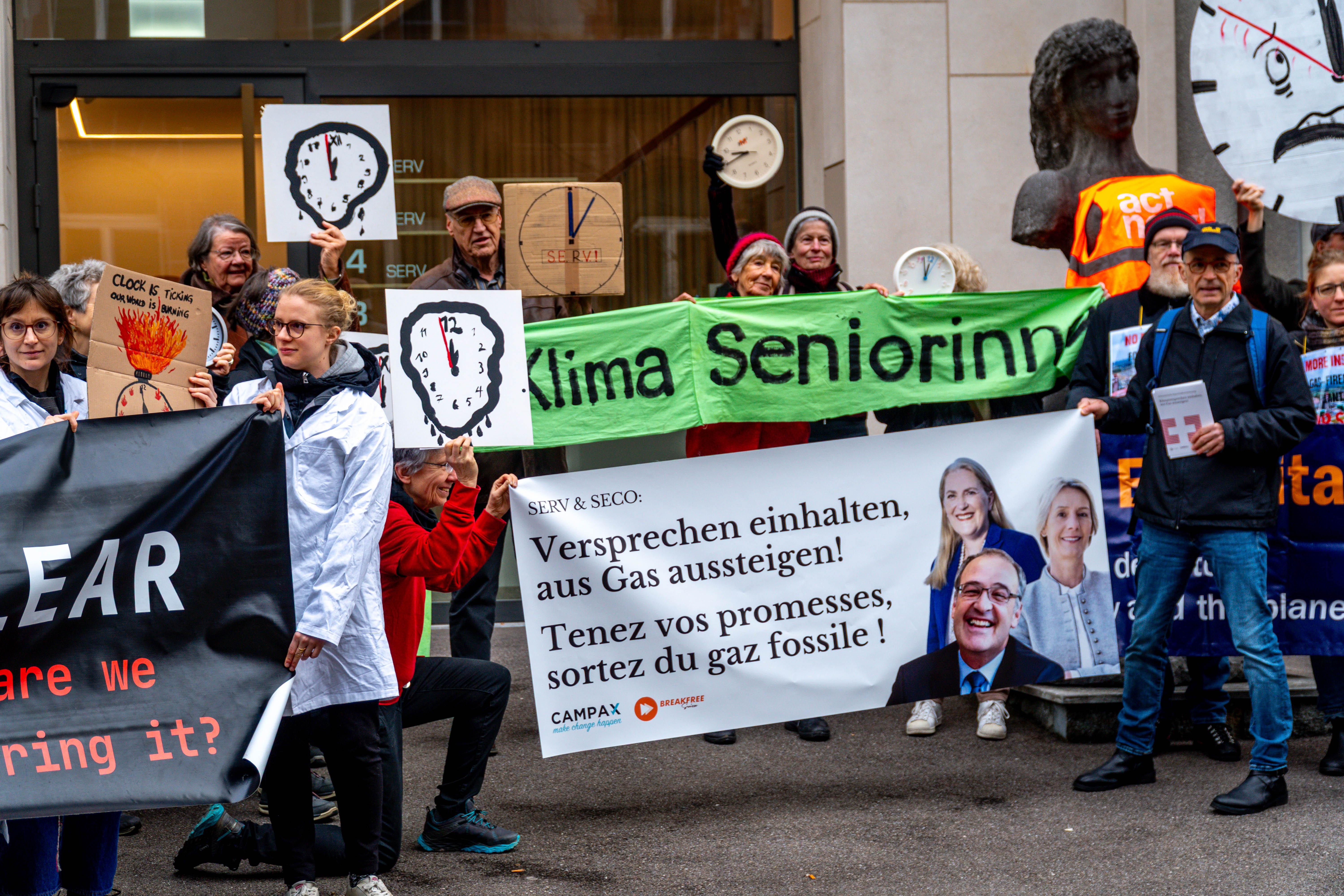 Activists protested outside the Swiss Export Risk Insurance (SERV) office in Bern in February, 2026. arguing the country is breaching its COP26 pledge to end overseas fossil fuel financing.