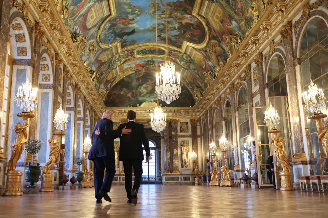US President Donald Trump (left) and French President Emmanuel Macron at the Palace of Versailles, where Trump signed a memorandum of understanding with Iran, on June 17.