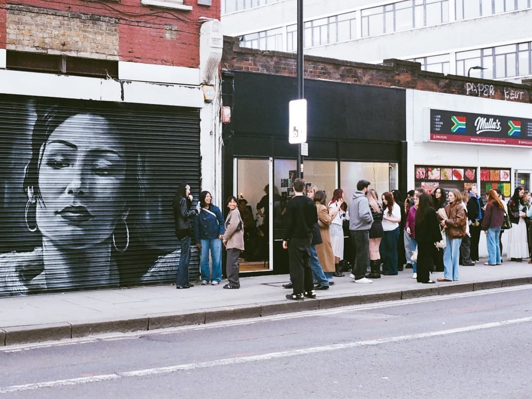 A mural of British indie-pop artist Nieve Ella adorns the shutters of Playliveartist House during one of the venue’s events.